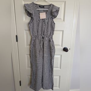 Kittenish black and white jumpsuit with pockets. NWT
